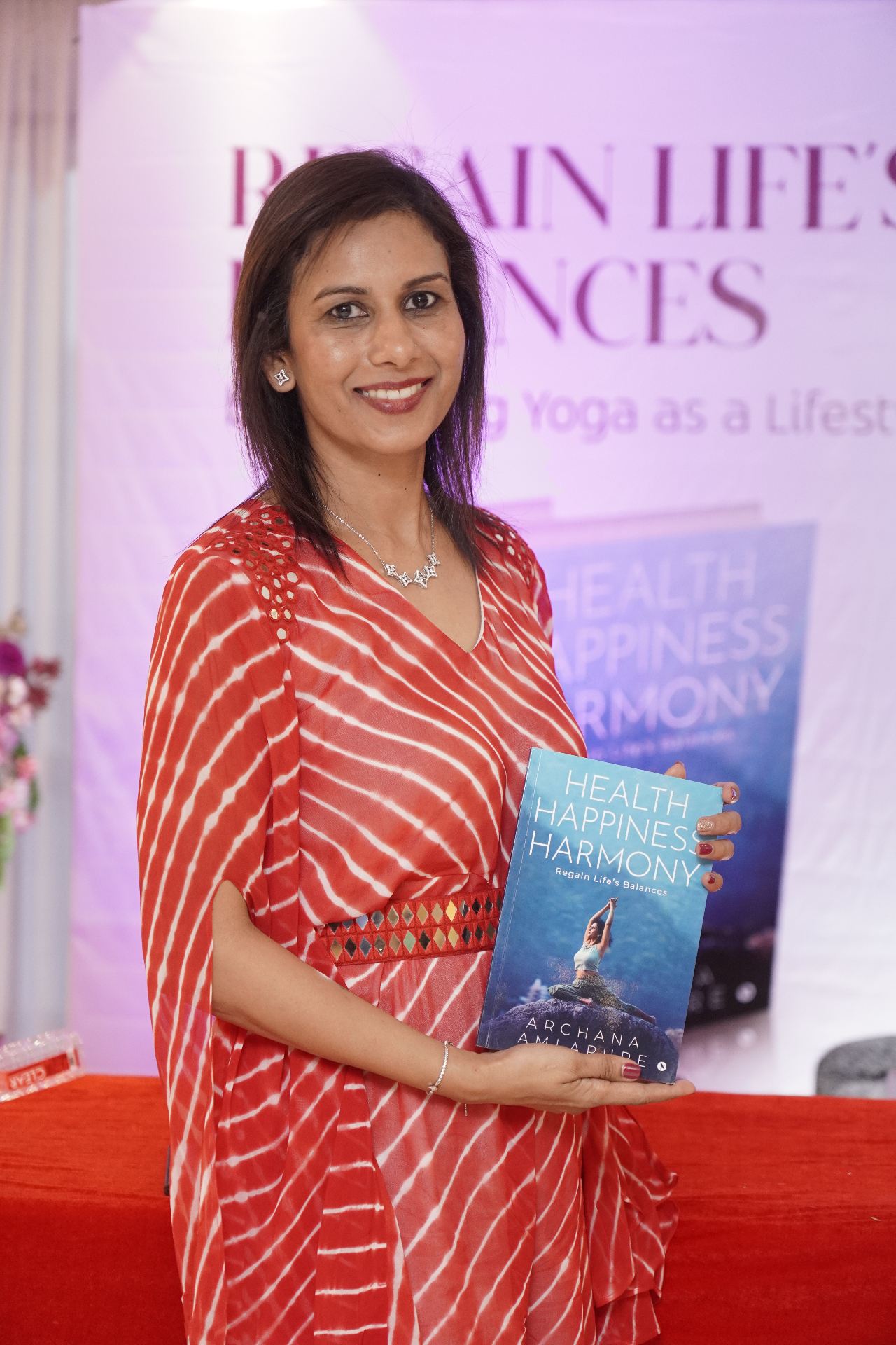 Archana with her book